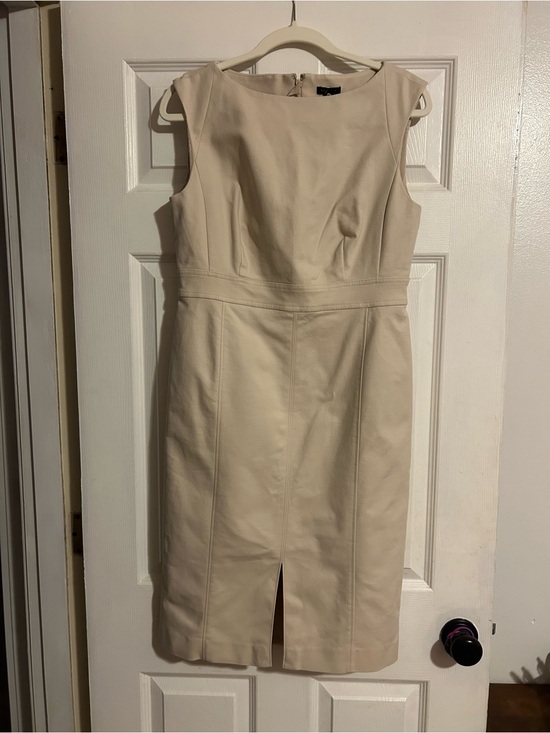 Ann Taylor Dresses & Skirts - Ann Taylor Front Slot Boatneck Sheath
Dress size 8 Cream
